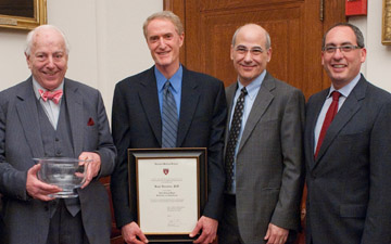 Above, left to right: Hedley-Whyte; Burstein; Brett Simon, MD, PhD, Edward Lowenstein Professor of Anaesthesia and head of the Department of Anaesthesia and Critical Care at BIDMC; and Kevin Tabb, MD, BIDMC president and CEO, celebrate the professorship and two remarkable careers