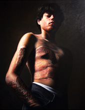 HAIR’S BREADTH: Adam was 15 when Doug Auld painted this  portrait of him. Three years earlier, Adam had been burned during an outing with friends. A compassionate young man, Adam often grows his hair long solely so that he may have it cut and donated  to groups that serve people who have lost their hair as a result of disease. 