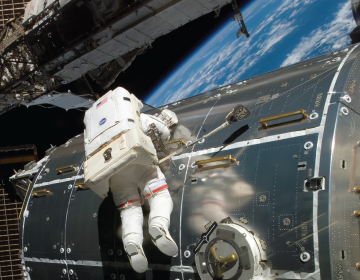ONE SHOE, TWO SHOE: The effects of disrupted sleep patterns or insufficient sleep can affect a person’s judgment in matters large and small, such as the choice of which boot matches which foot. <br/>Photo credit: NASA