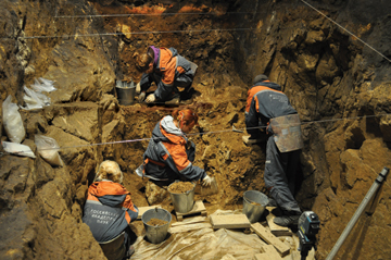  DOWN TO EARTH: Excavation of Denisova Cave, a site overseen by the Russian Academy of Sciences, is an ongoing venture involving international teams of researchers.<br/>Photo courtesy of David Reich