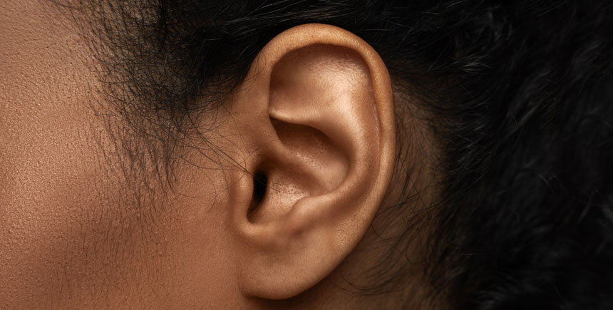 Close up view of a woman's left ear 