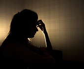 silhouette of stressed young woman