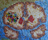 Mosaic of brain with colorful cluster of tiles in one hemisphere