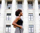 photo of lash nolen in front of Gordon Hall