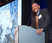 photo of satcher at podium