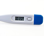 photo of digital thermometer showing a reading of 101.5