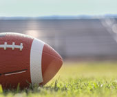 Photo of a football on a grassy field