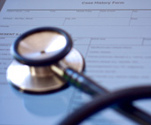 photo of stethoscope on medical form