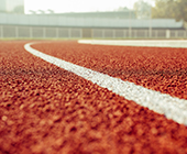 Low angle shot of a running track