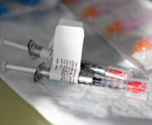 syringes with covid-19 labels