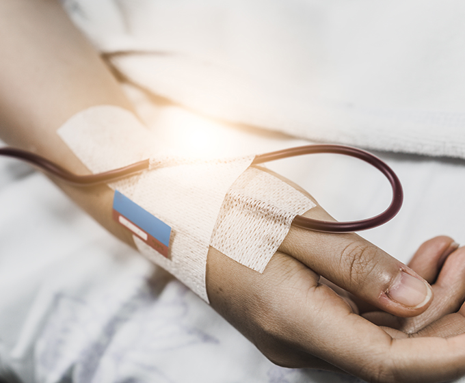 photo of white persons arm with IV line