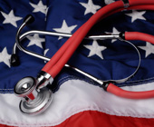 red stethoscope on American flag