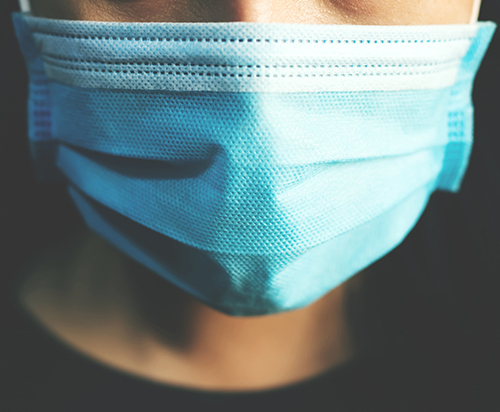 Closeup image of person with mask on