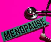 The word menopause on a banner next to a stethoscope on a hot pink background