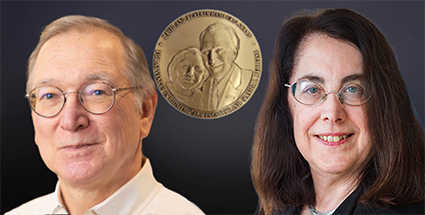 Gordon Freeman and Arlene Sharpe with the Hamburg Award on a dark background