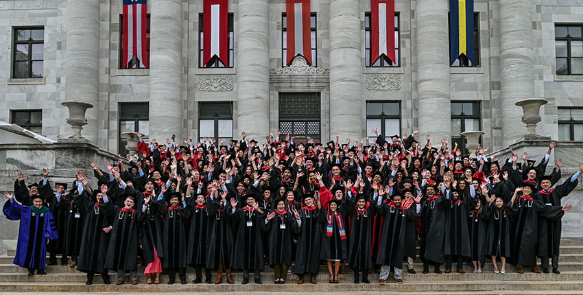 The entire medical and dental school class on the steps of a marble building.