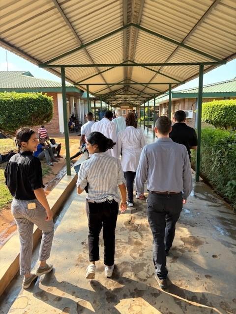 MGH faculty and HMS medical students walking with the clinical team at Mzuzu Central Hospital in Malawi