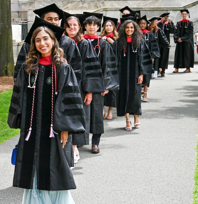 Graduating students walking on the Quad. Image: Steve Lipofsky