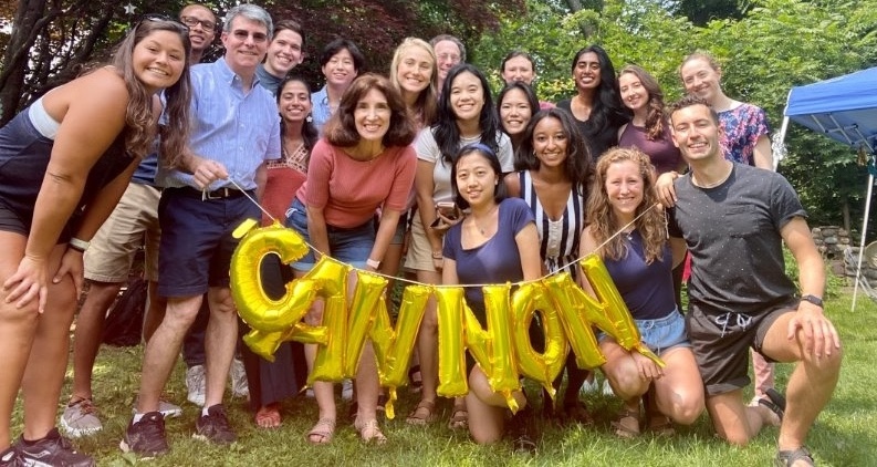 Cannon Society students and faculty posing at an outdoor event with the word "Cannon" spelled out in balloons.
