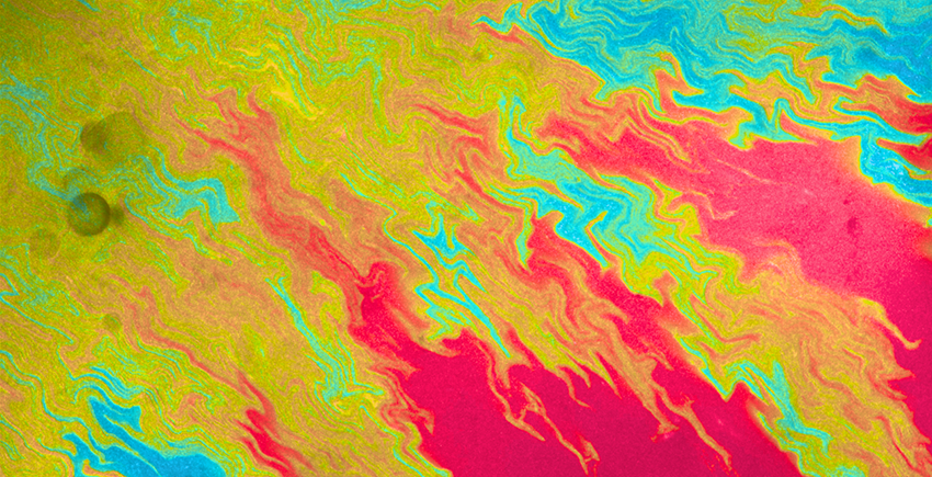 Abstract flows of red, orange, green, and blue