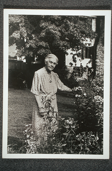 Alice Hamilton standing in a garden