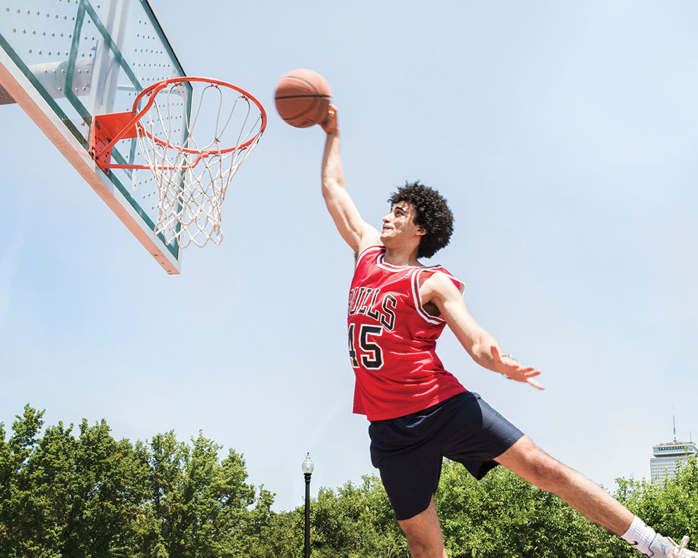 portrait of Troy Ameen while playing basketball