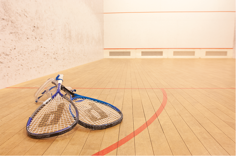 two racquets on squash court 