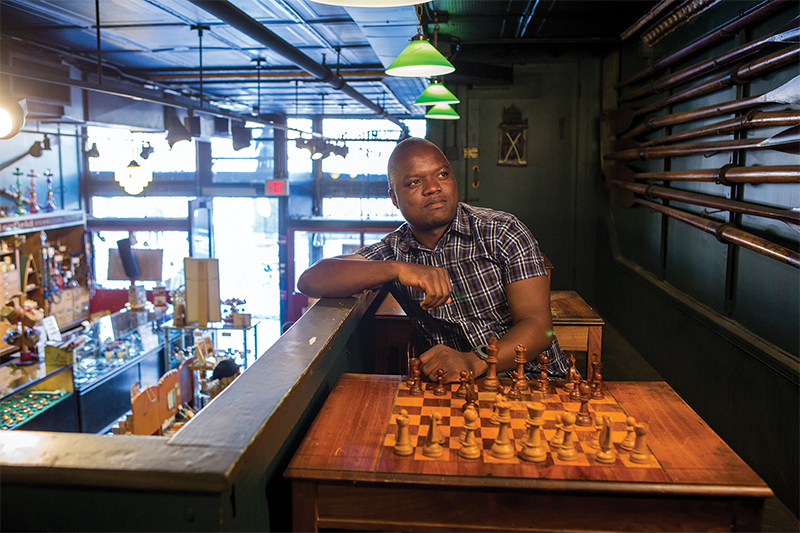 Chenjezo Grant Gonani at chees table in Harvard Square