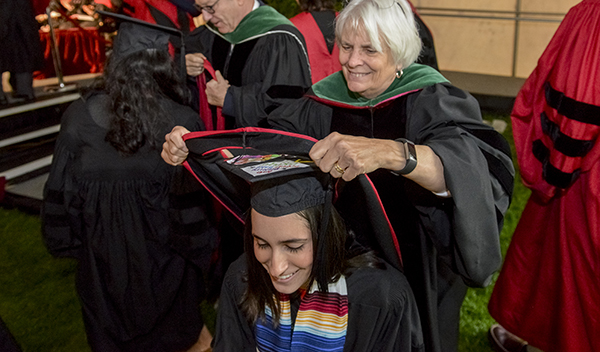 HMS grad Daniela Delgado receives her hood at 2017 Class Day