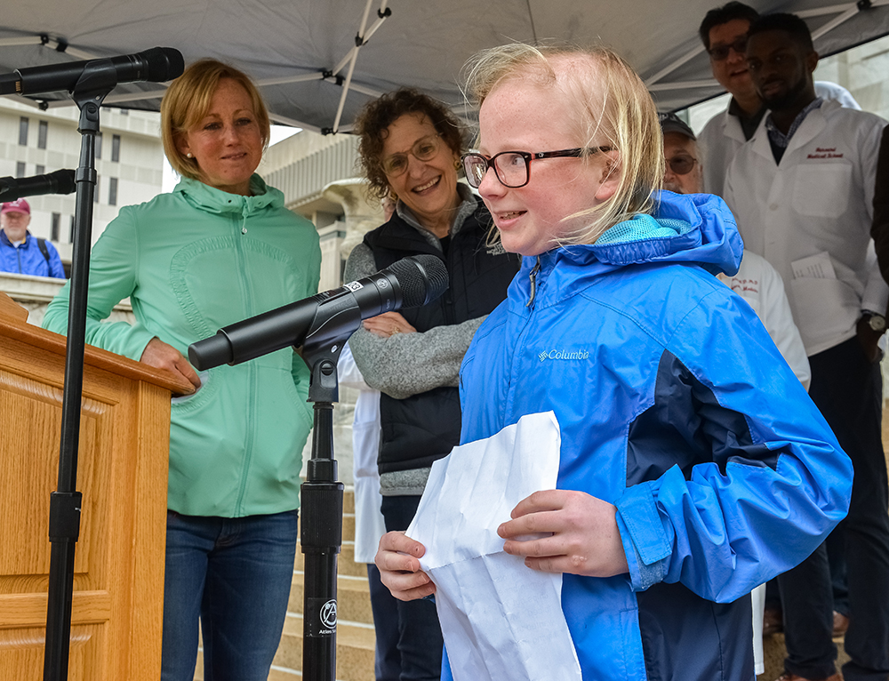 11-year-old Emily Coughlin introduces herself at the HMS March for Science rally. Image: Steve Lipofsky
