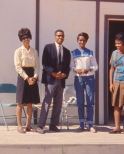 Between marches, a young Alvin Poussaint (second from left) served as the southern field director of the Medical Committee for Human Rights. With him are staff members from the Holmes County Community Center and Clinic in Tchula, Mississippi. Photo courtesy of Alvin Poussaint.