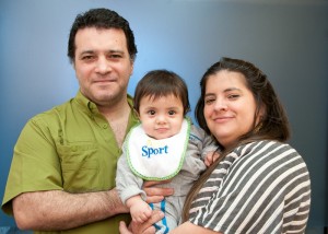 Agustín Cáceres with his father, Alberto, and mother, Marcela. Photo: Patrick Bibbins/CHB