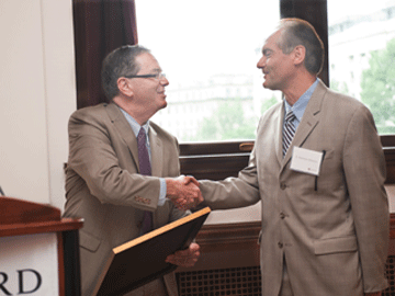 From left, Jeffrey S. Flier, dean of HMS, and E. Antonio Chiocca, Harvey W. Cushing Professor of Neurosurgery. Image: Suzanne Camarata