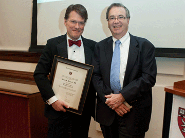 (from left): Jeffrey S. Flier, dean of HMS, and James Rathmell, Henry Knowles Beecher Professor of Anesthesia. Image: Suzanne Camarata