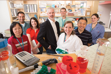 Investigators, from left: Yuhong Guo, Jesse Kumar, Laura Smith, Chris Cowan, Adam Harrington, Maria Carreira, Makoto Taniguchi and Rachel Penrod-Martin. Not pictured: Carly Hale and Mike Robichaux. Image: Patrick O'Connor. 