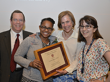 “Most importantly, Dr. Royce embodies what any instructor should be: skilled not only at her craft but at imparting it to others,” said second-year student Lydia Flier (right), daughter of HMS Dean Jeffrey S. Flier, about obstetrics, gynecology and reproductive biology instructor Celeste Royce (second from right), one of the two winners of the 2015 Harvard Medical School Charles McCabe Faculty Prize for Excellence in Teaching. Image: Steve Gilbert