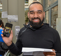 Devon Taylor on video with his wife and children in Virginia letting them know he will do his emergency medicine residency at Duke University. Image: Steve Lipofsky