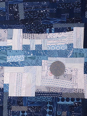 Susana da Silva made a quilt inspired by the patterning of cells in the chick retina. The gray circle represents the high-acuity area, or rod-free zone. Image: da Silva