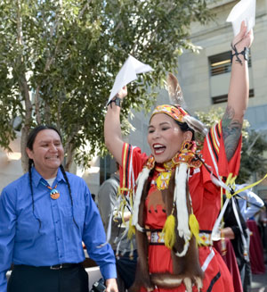 Erica Kiemele celebrates her match in emergency medicine at the University of Southern California with Jason Packineau, community coordinator at the Harvard University Native American Program.