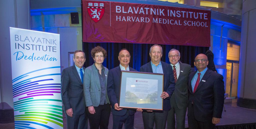 Harvard officials with Len Blavatnik holding institute citation