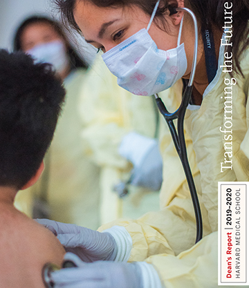 Dean's Report cover showing female student with pediatric patient