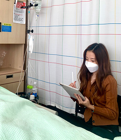 Dahee Chung in hospital room