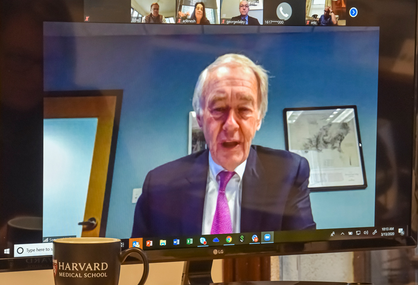 screenshot of senator marking on video conference with others