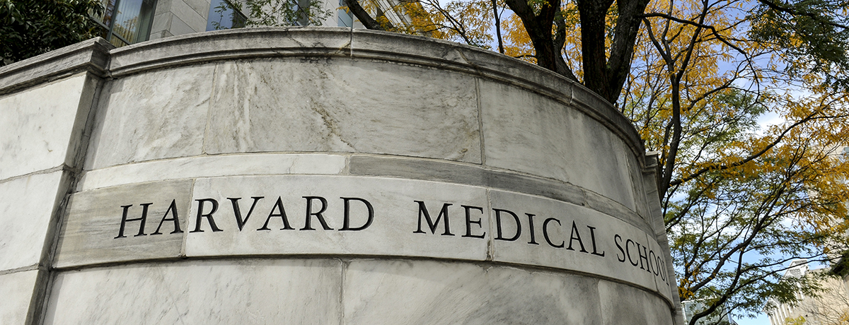 Photo of the entrance to the Quad, Harvard Medical School carved in marble