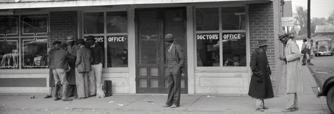 Titled “Negroes in front of doctor’s office in Merigold, Mississippi,” this photo was taken in late 1939 by Marion Post Wolcott, a noted U.S. photographer who worked for the Farm Security Administration during the Depression.