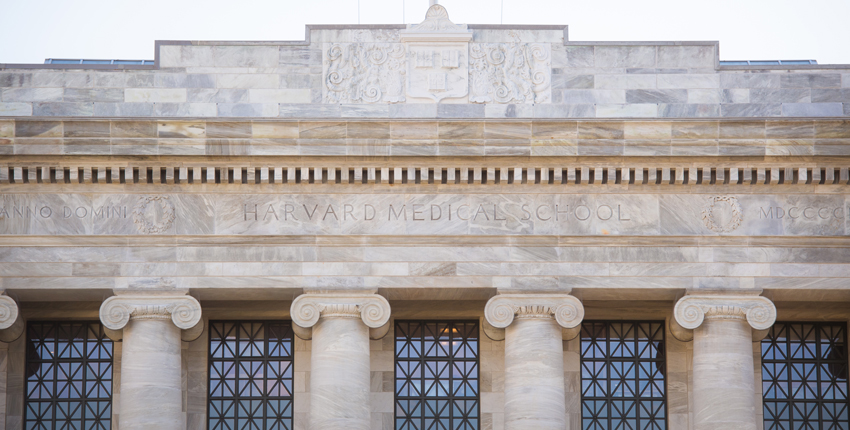 Facade of Gordon Hall chiseled with Harvard Medical School