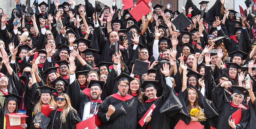 Graduates gathered for a celebratory photo after receiving their diplomas