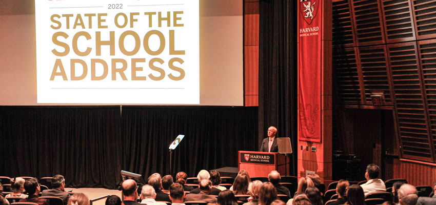 Photo of Daley at podium in Martin amphitheater during speech. 