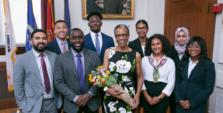 Dr. Joan Reede surrounded by 2023 participants of the Visiting Research Internship program. 