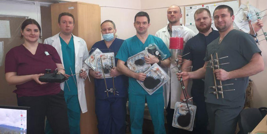 Image of physicians and health care providers in Dnipro Children's Hospital, Ukraine, holding wound pumps and other medical equipment